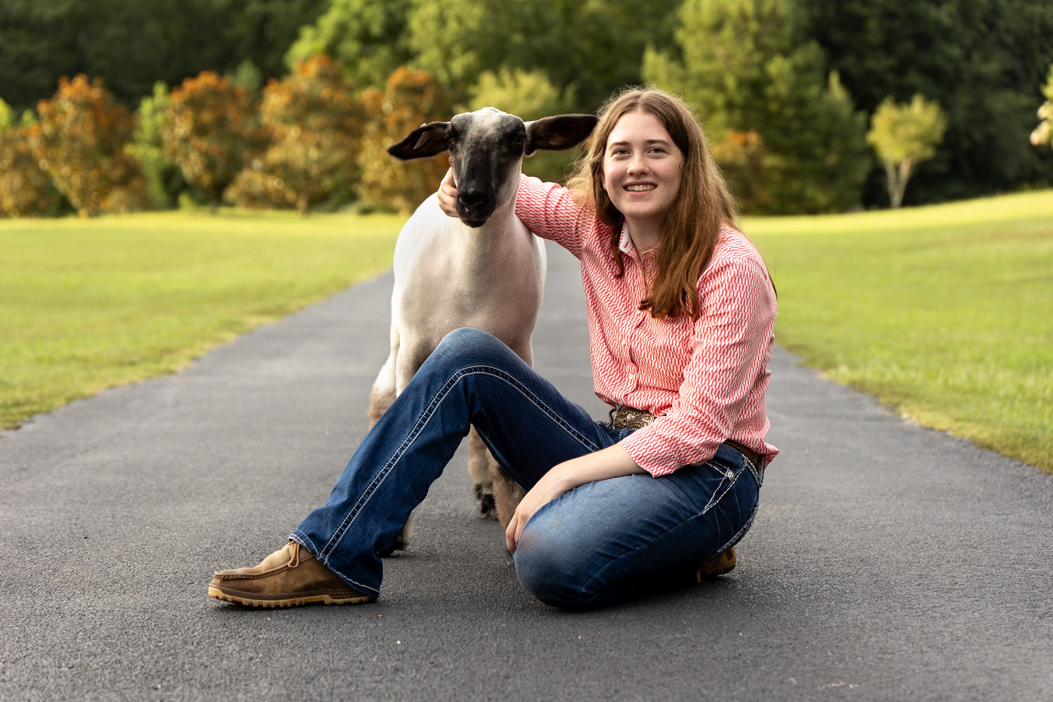 livestock senior portrait - girl sits next to her sheep | GA senior photographer