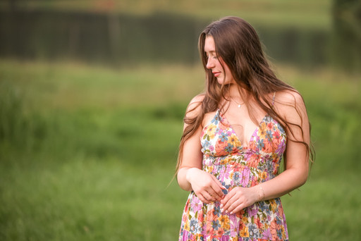 Rural, in a field, senior portrait outside of Atlanta, GA of girl in a multicolored dress | Georgia Senior Photographer