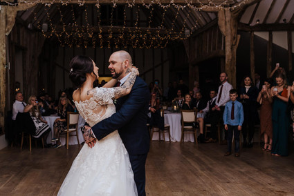 newly married couple having their first dance together