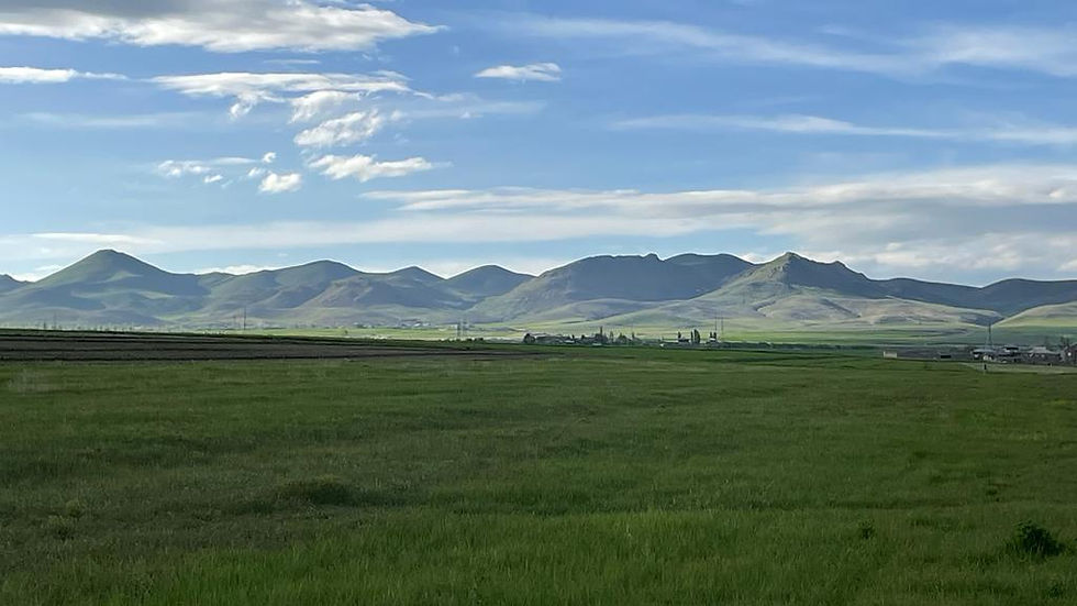 View of the mountains behind the center Emili Aregak