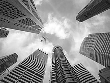 Entrepreneurial business expansion represented by towering cityscape