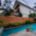 Wooden residential fence built by Tiburon Services LLC for backyard privacy.