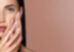 Beautiful model girl with a French manicure nails. Woman Fashion makeup and care for hands