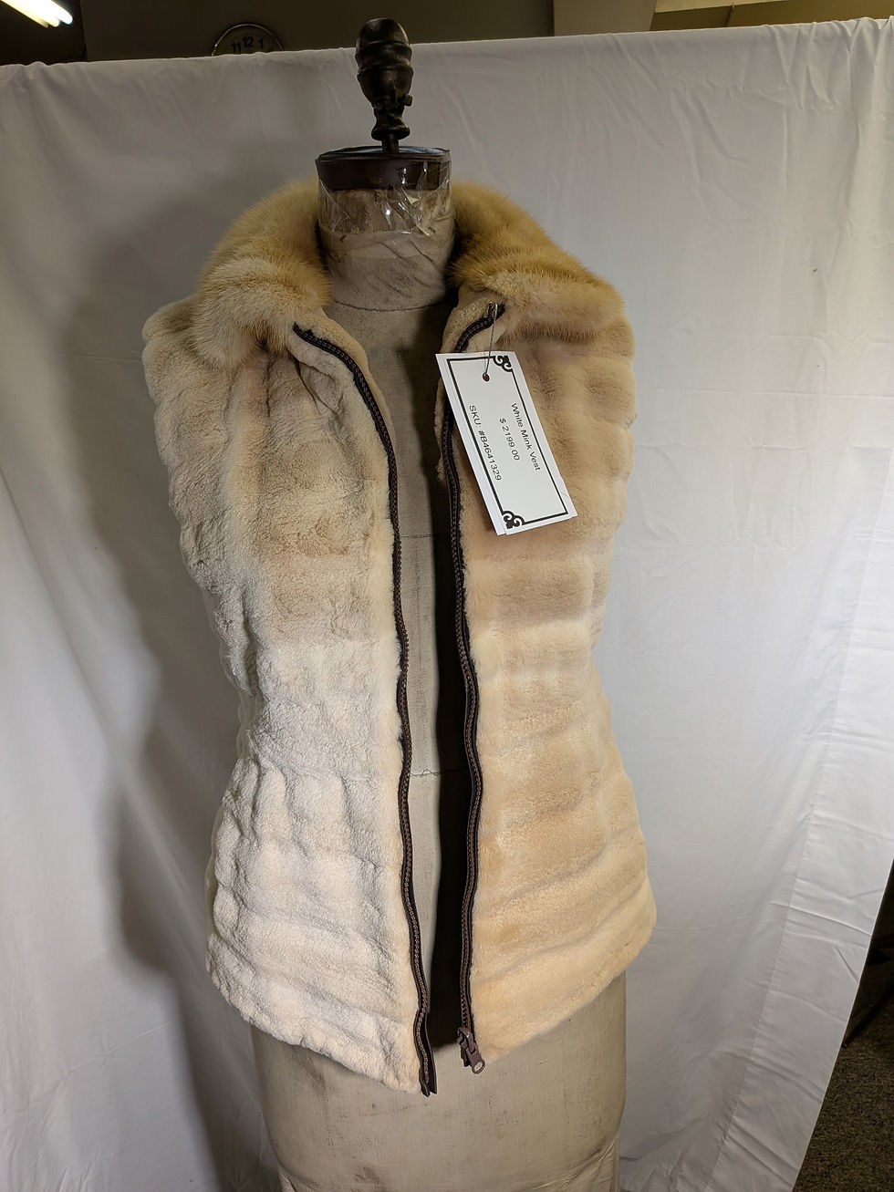 White Mink Vest displayed on mannequin