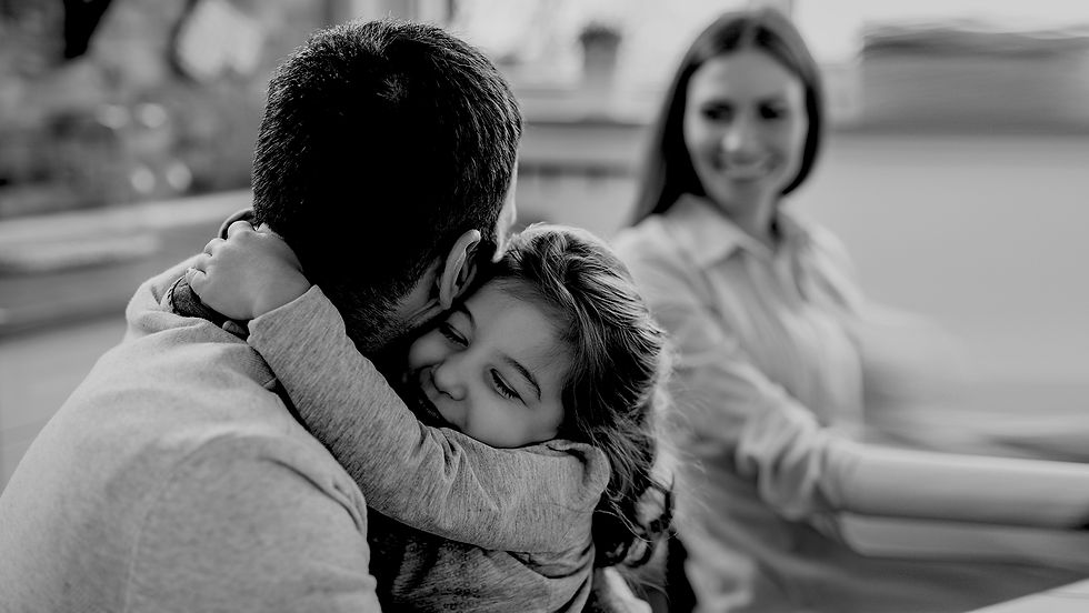 Little girl with parents.jpg