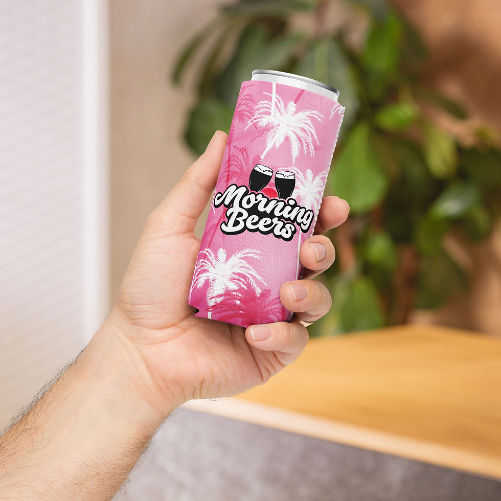 Hand holding a pink and white palm tree covered, seltzer koozie, flaunting the Morning Beers design, featuring two pint glasses clinking over a rising sun.