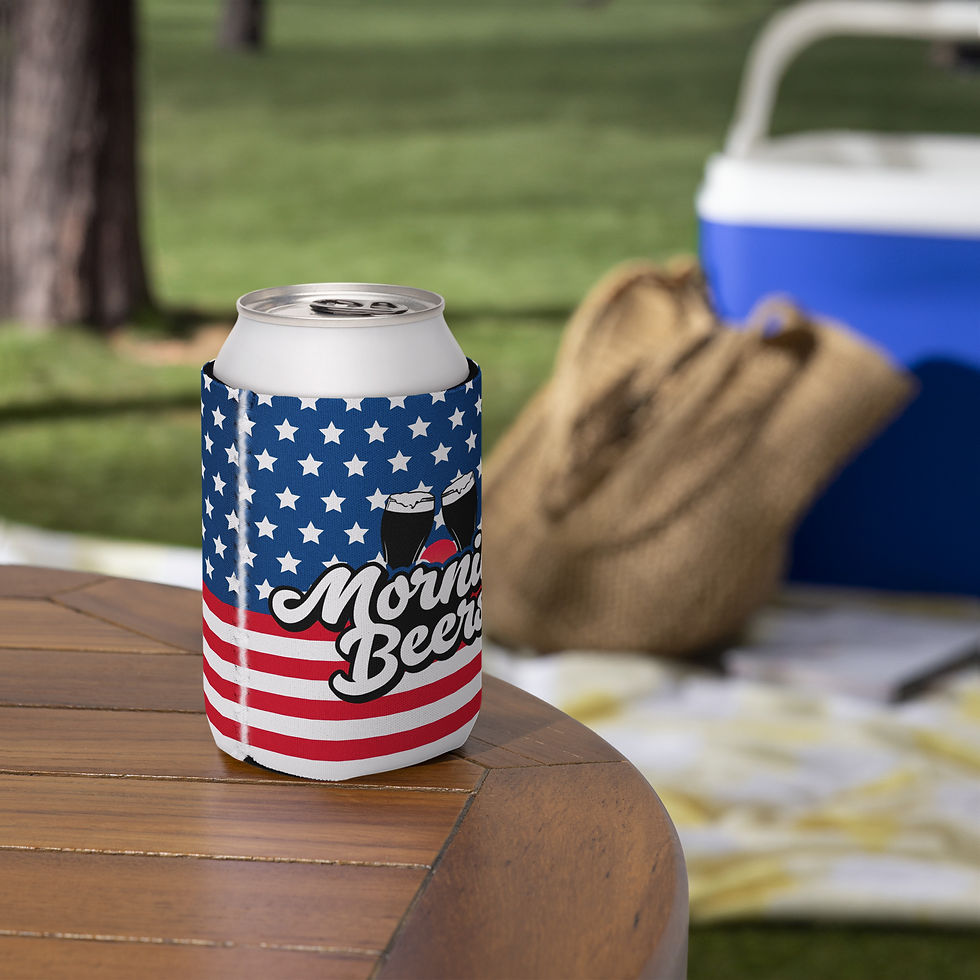 American flag beer can koozie, positioned at a picnic, flaunting the Morning Beers design, featuring two pint glasses clinking over a rising sun.