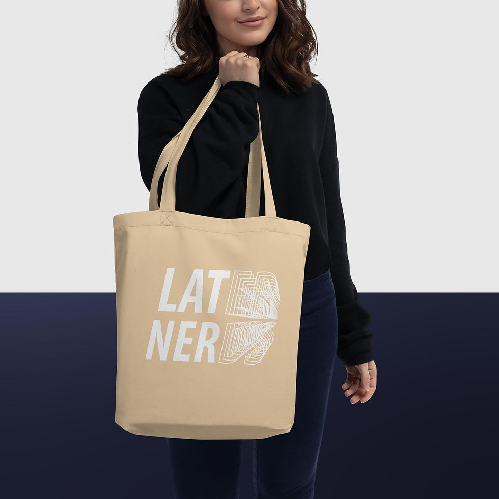 Oyster-colored tote bag featuring the "Later Nerds" design in bold white retro lettering with layered text effects, held by a woman wearing a black sweater.
