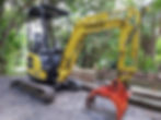 Mini excavator with hydraulic grab