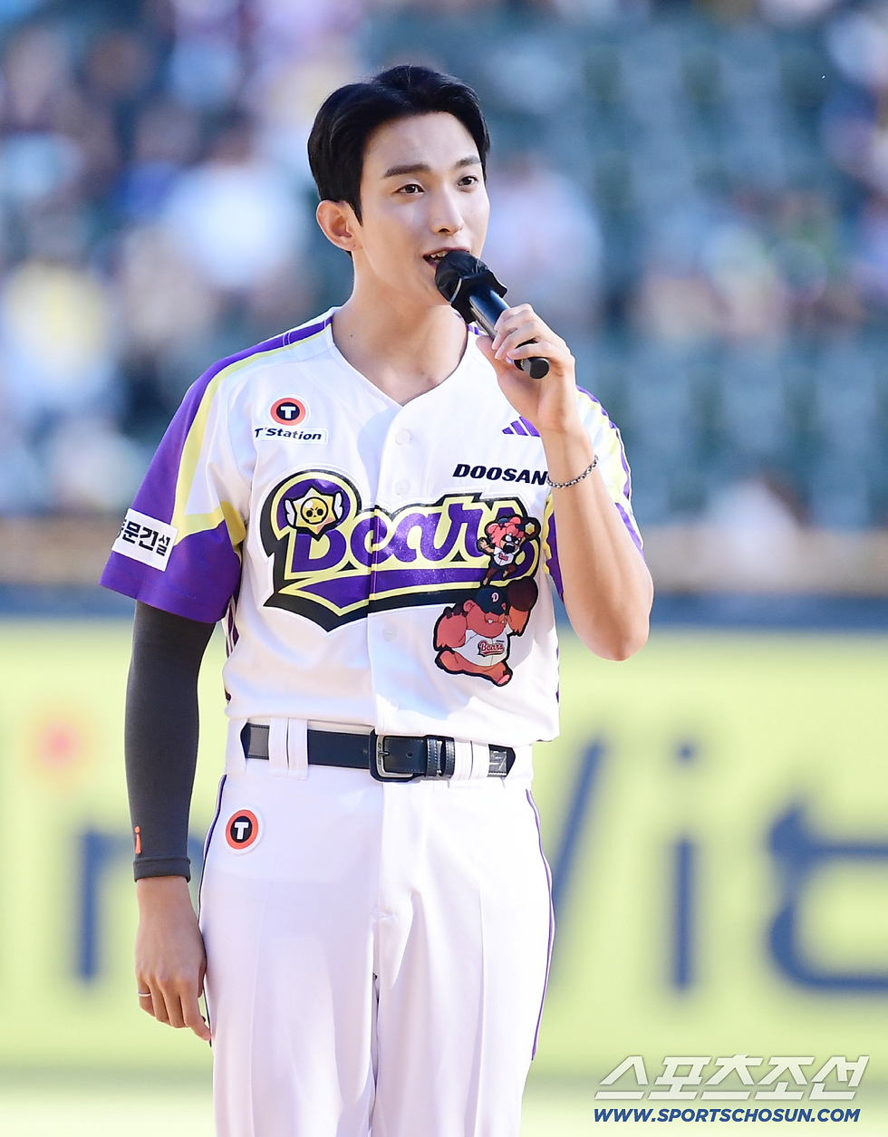 Dokyeom giving a greeting before the first pitch.