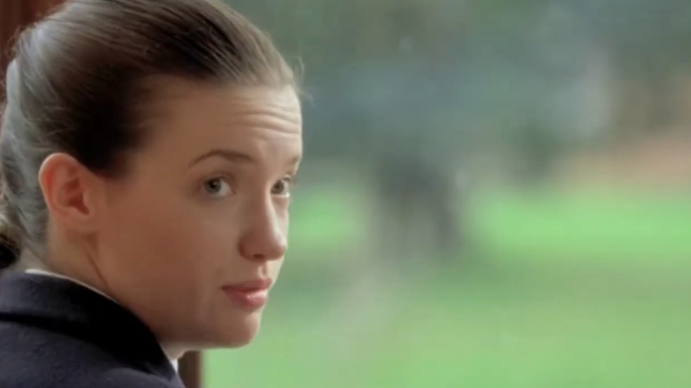 Talulah Riley as Annabelle, looking over her shoulder, away from the school lawn.