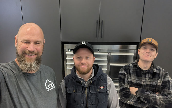 Delux Cabinets on site cabinet install.jpg