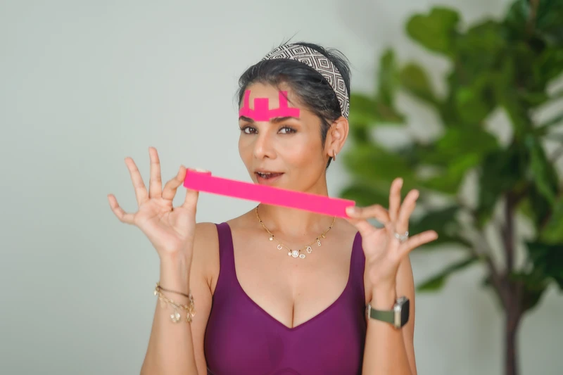 Parmita using face tape for natural face-lifting