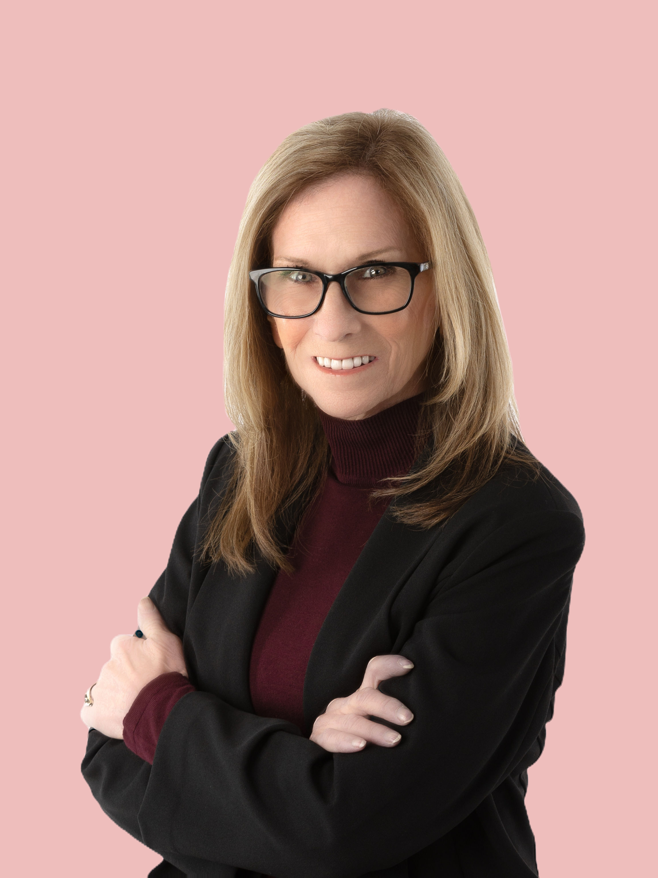 Kathleen headshot 3 arms folded.JPG