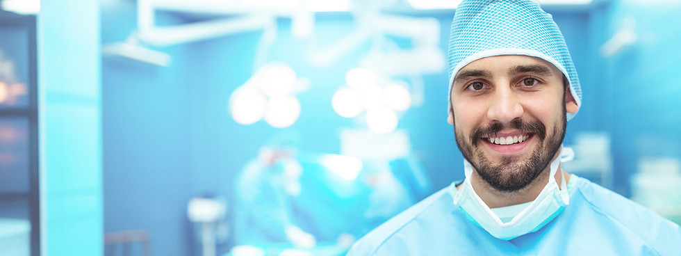 portrait-of-male-surgeon-smiling-in-operation-thea-2026-03-25-00-52-36-utc_Ng.jpg