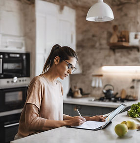 a woman filling out a digital form in a kitchen.jpg