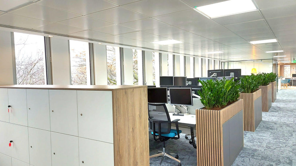 Commercial fit out company delivering open-plan office environments with integrated storage and collaborative workspaces