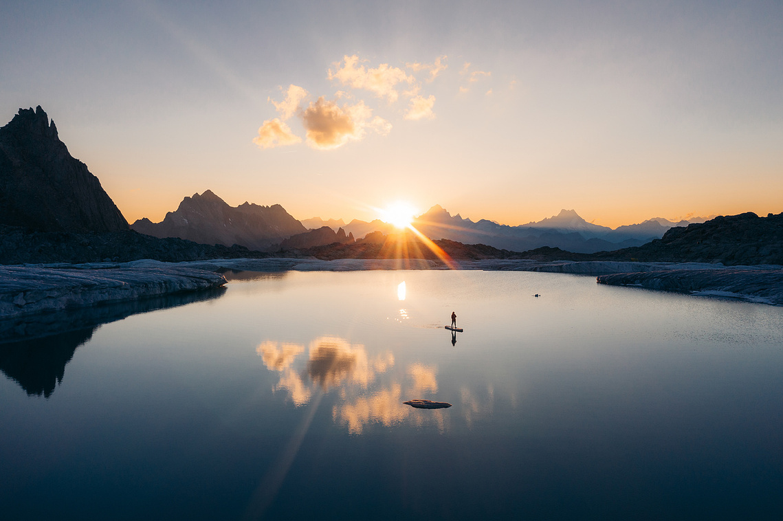 Lightfall: sunrise over a mountain lake