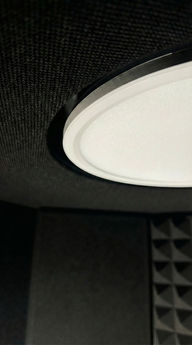 Interior of VB-1 sound isolation booth showing acoustic treatment and integrated lighting