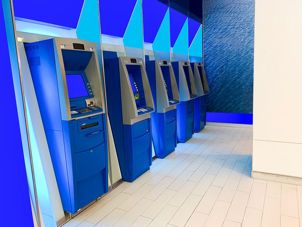 A photo of the ATM machines in a line.