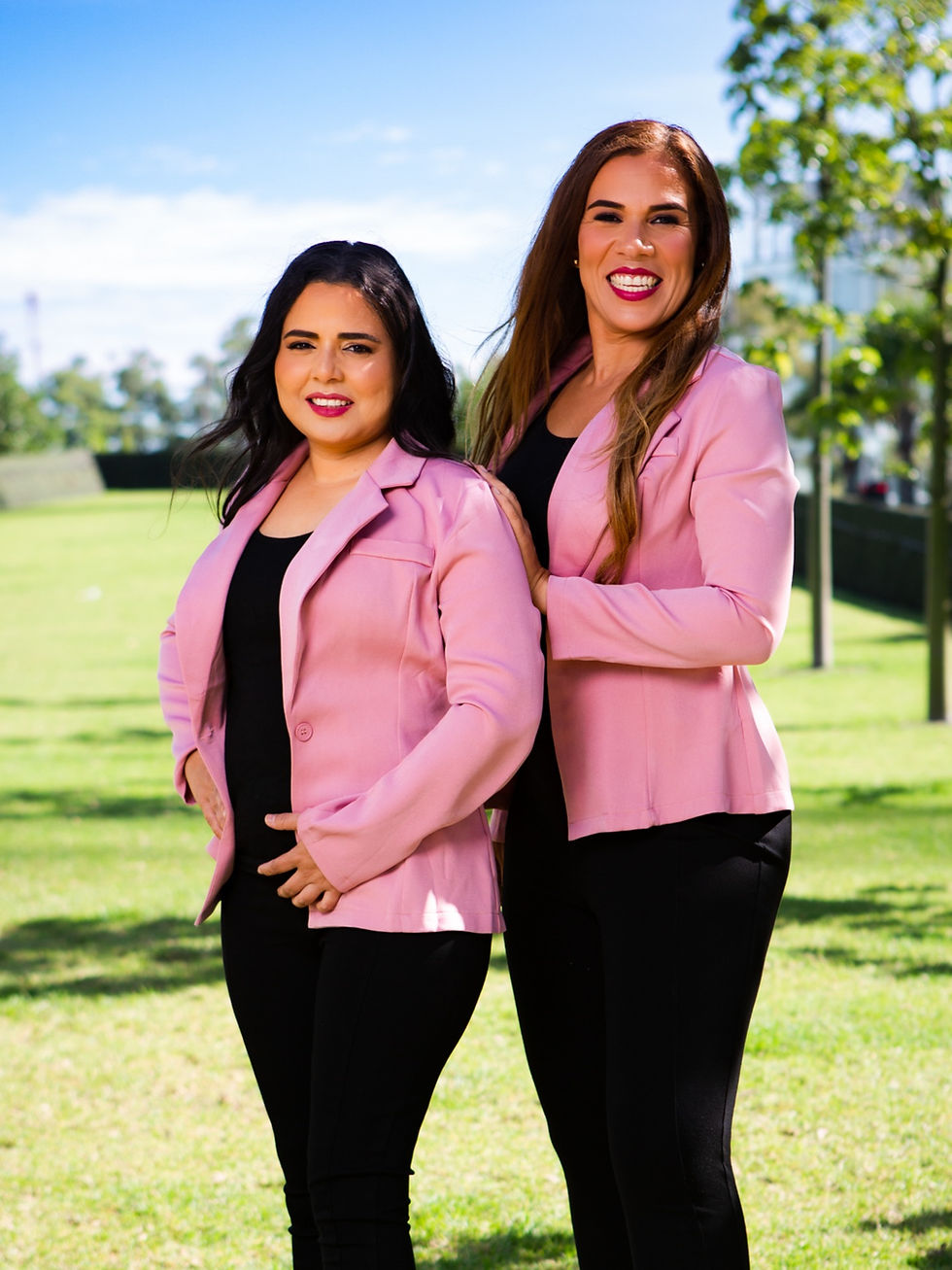 A portrait shot of the two owners of Pink Clean in a pink blazer.