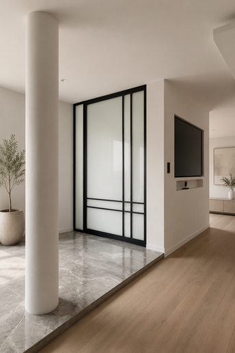 Porte en acier et verre sur pivot installée dans une maison contemporaine en Wallonie