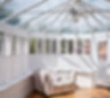 white hardwood shutters in a colchester conservatory
