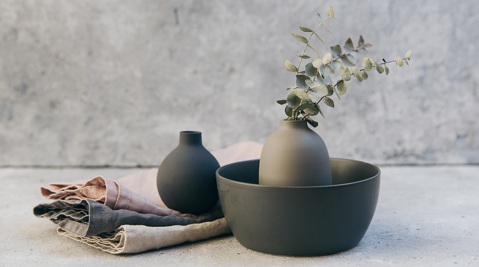Clay pottery with table linens
