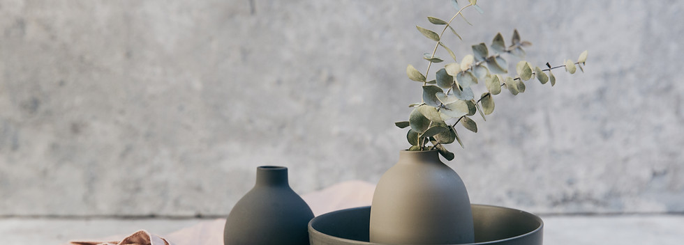 Clay pottery with table linens