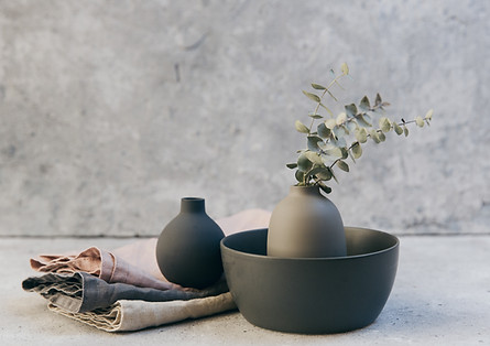 Clay pottery with table linens