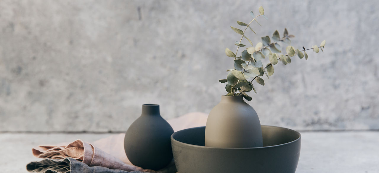 Clay pottery with table linens