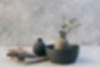 Clay pottery with table linens