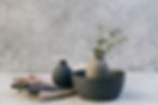 Clay pottery with table linens