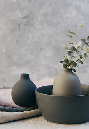 Clay pottery with table linens