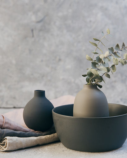 Clay pottery with table linens