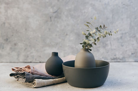 Clay pottery with table linens