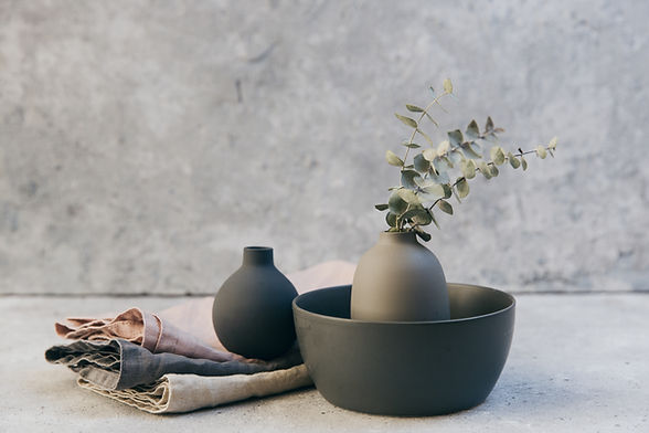 Clay pottery with table linens