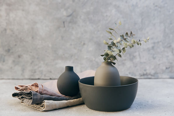 Clay pottery with table linens
