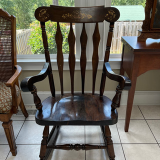 Wooden armchair at estate sale in Augusta, Ga