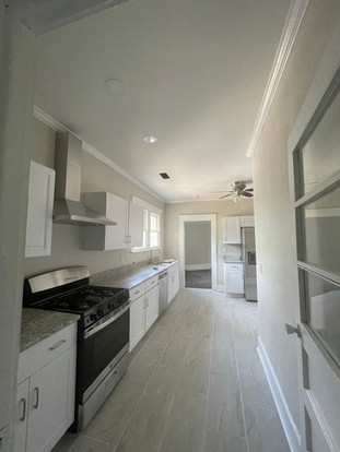 Investment property in Augusta, GA needed floors refinished, minor repairs, painting, and furnishing.