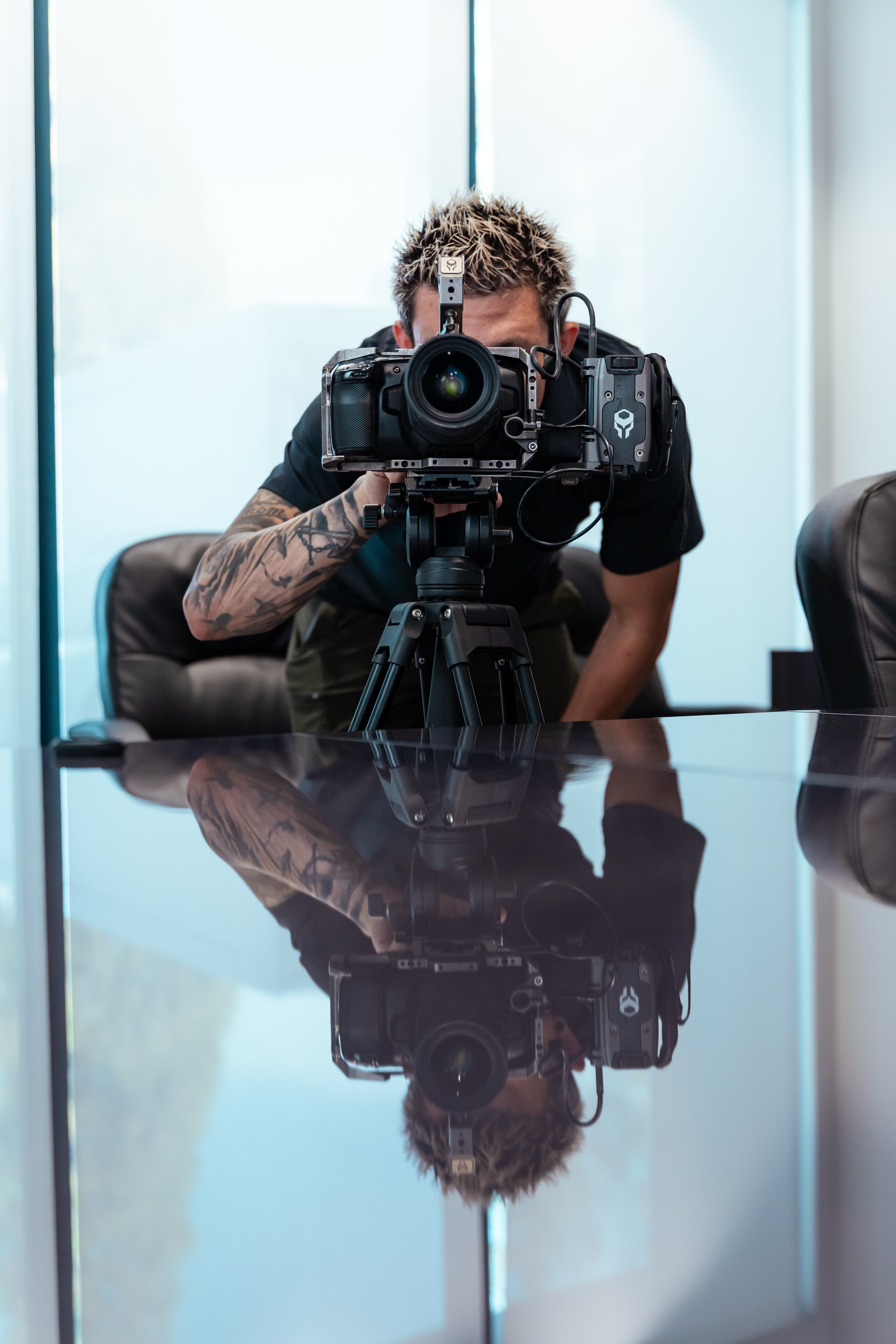 Video director Matt Johnson adjusts settings on Red Komodo camera before filming testimonials for AZ Accident.
