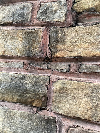 cracked leaky chimney bricks