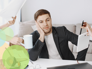 Professional experiencing workplace stress while working at a desk