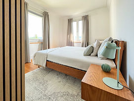 Modern Bedroom Design with wooden items (bed, nightstand and a woodup frame)