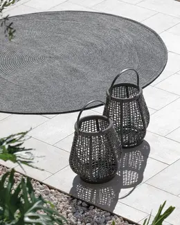 LUDO Lantern – Styled in a high-end residential garden or terrace, full view.