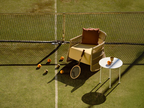 ESCALA Rocking Chair styled on a tennis court