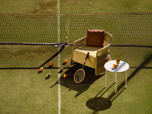 ESCALA Rocking Chair styled on a tennis court
