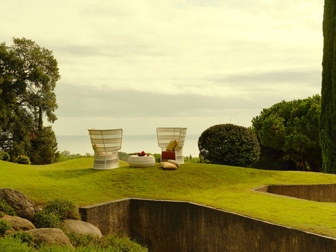 ESCALA High Back Lounge Chairs with coffee table overlooking the coast