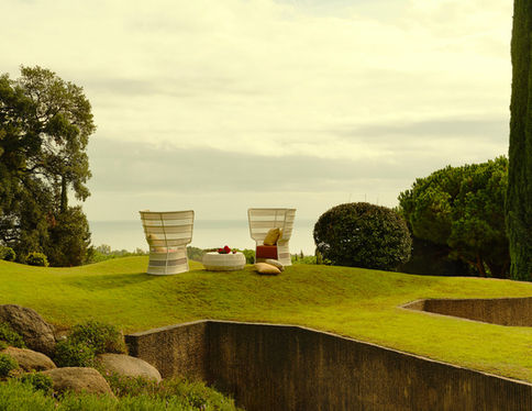ESCALA High Back Lounge Chairs with coffee table overlooking the coast