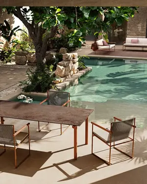 Outdoor furniture Atmosphera Pipe collection in courtyard armchairs and table